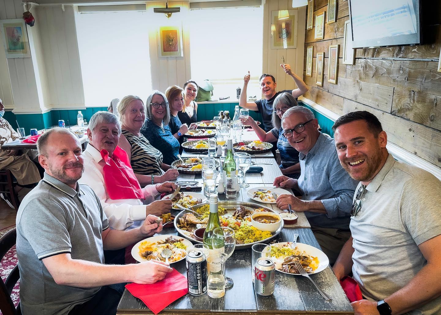 Guests sharing a meal at Qashqai Kitchen